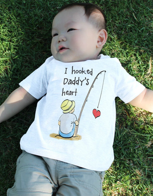 Load image into Gallery viewer, I Hooked Daddy's Heart Baby Shirt
